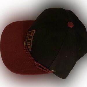 Findlay hat blue and burgundy.